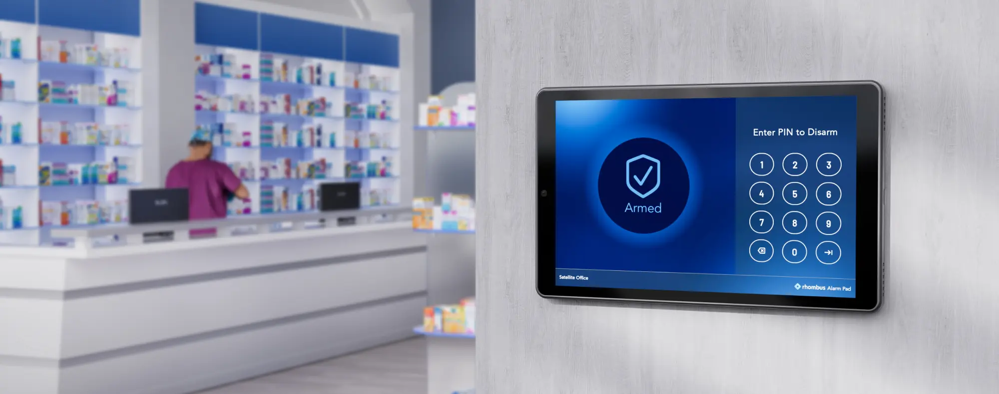 A Rhombus TS10 Alarm Pad mounted on a wall, designed to make arming and disarming sites simple, secure, and reliable.