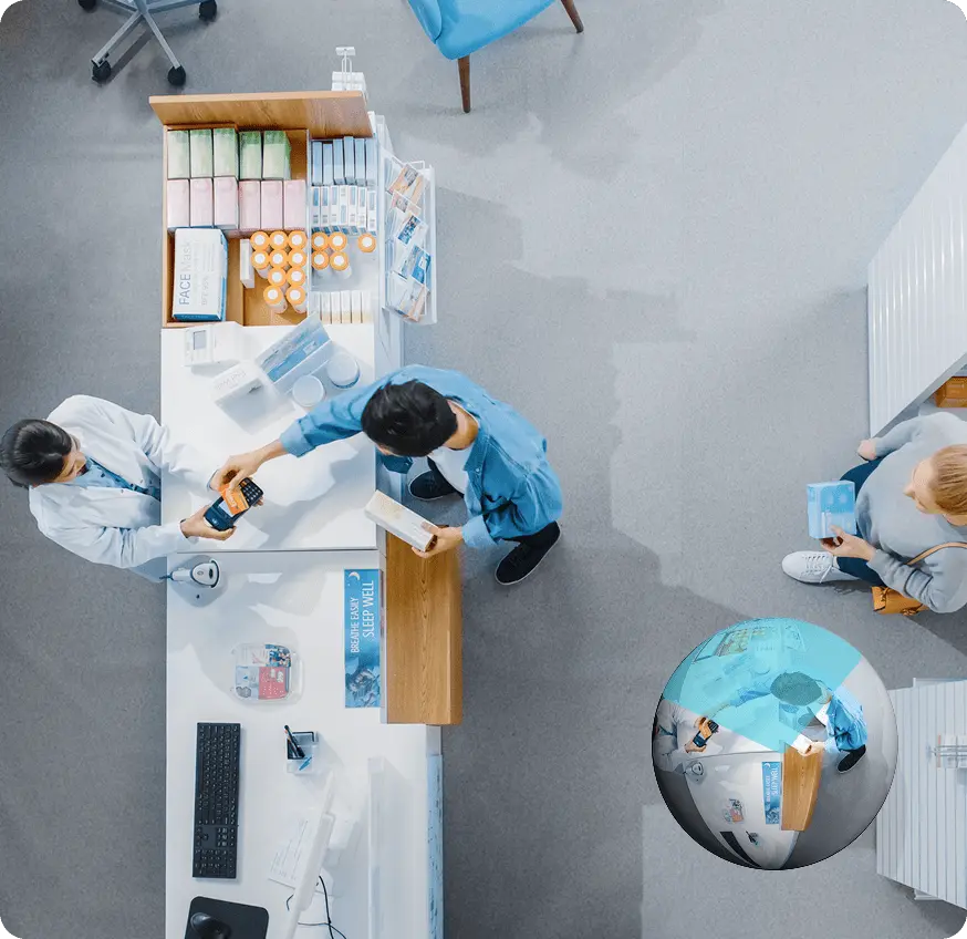 Image from a Rhombus fisheye security camera showing a customer completing a transaction at a retail counter with motion detection.
