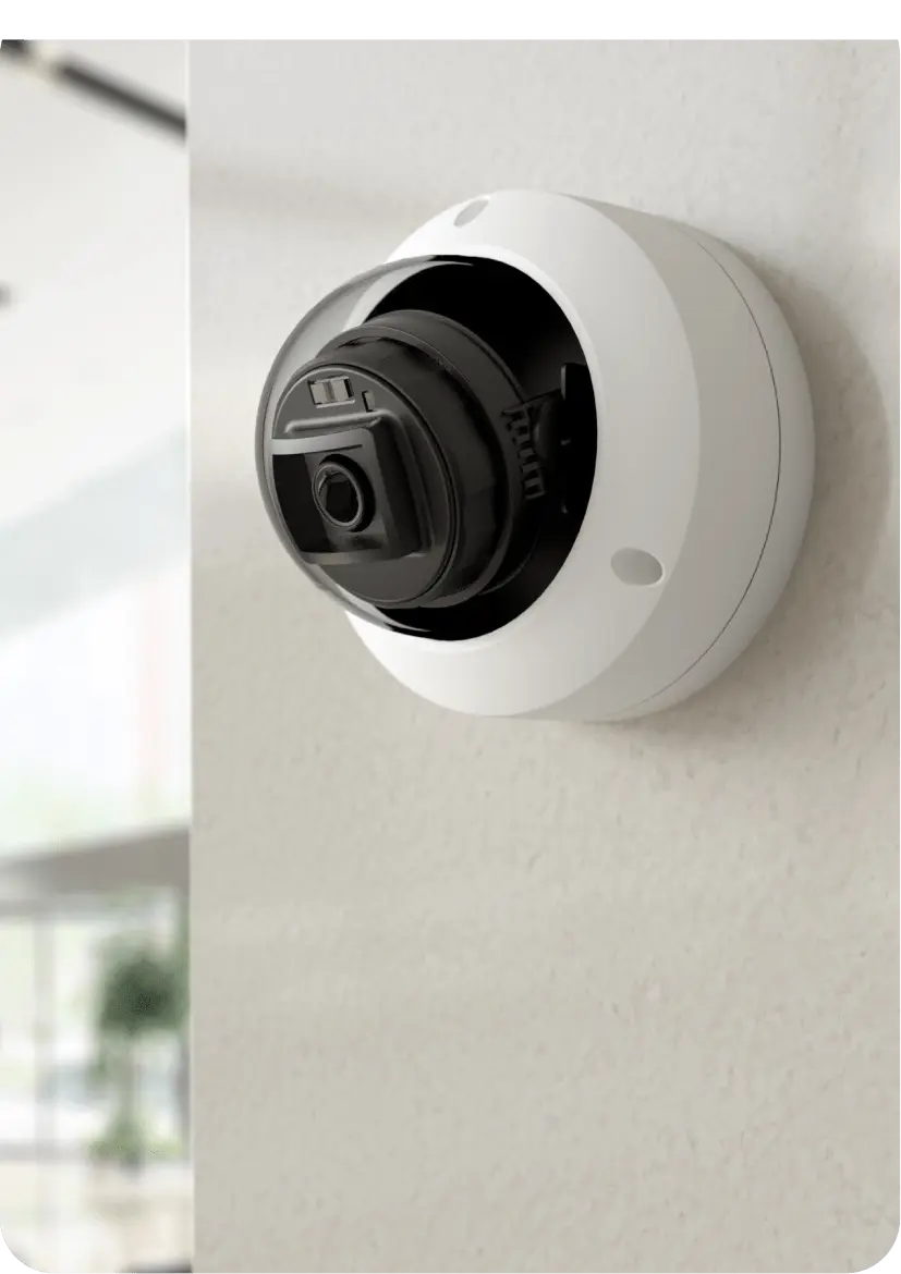 R200 Rhombus dome camera mounted on a white wall, showcasing its sleek form factor and versatile design for indoor and outdoor security needs. This dome camera features infrared night vision, motion detection, and high-quality video capabilities, ensuring effective monitoring and perimeter protection for retail stores and other environments