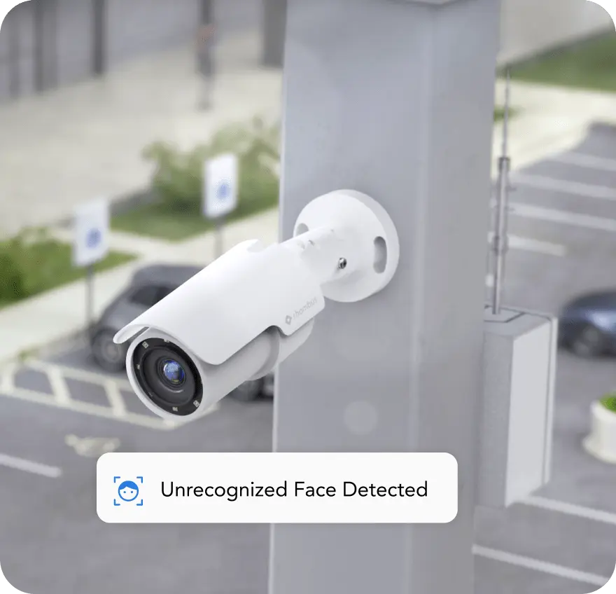 Bullet security camera placed in a parking lot, designed for effective surveillance to deliver long-range detail.