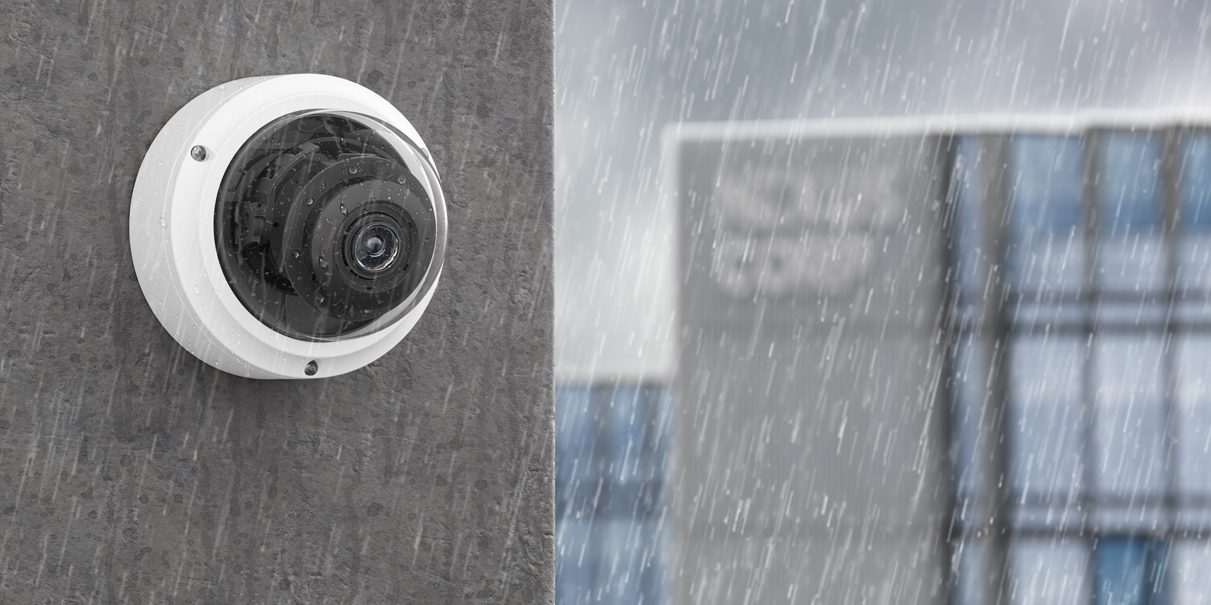 Image of the R410 Dome Camera on wall in outdoor environment in rain.