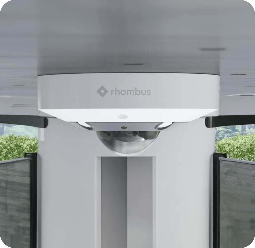 Rhombus fisheye camera on a ceiling, featuring a fisheye lens to enhance security with wide-angle IP camera capabilities.